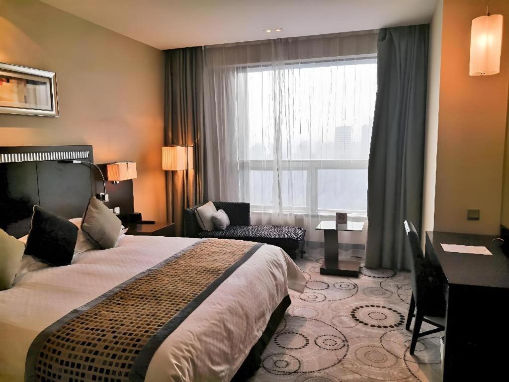 Grand Soluxe Zhongyou Hotel Sanghaj Kültér fotó