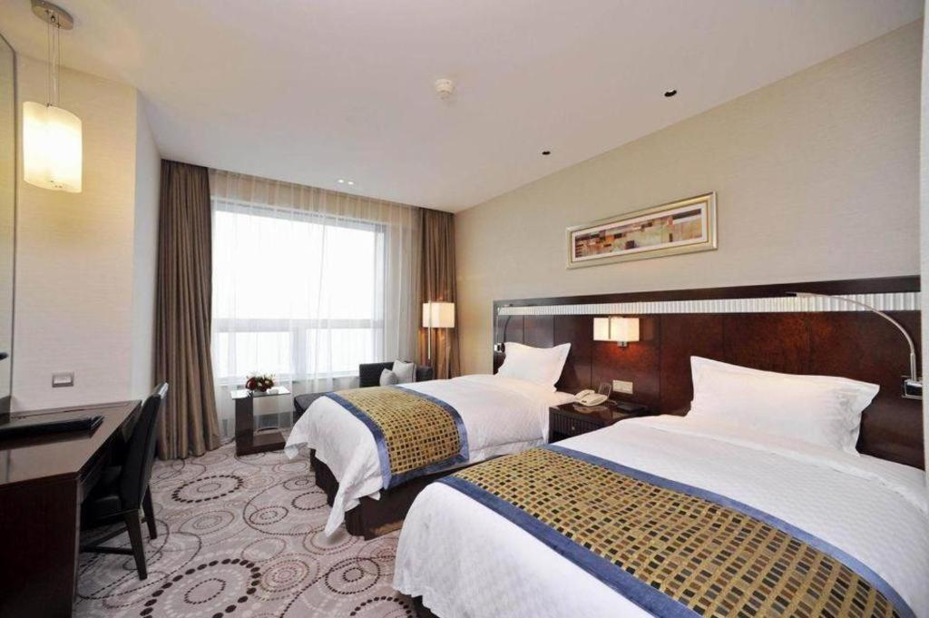 Grand Soluxe Zhongyou Hotel Sanghaj Kültér fotó